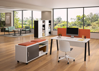Lifestyle image of Buronomic Alto 146 cm cabinets in black and white by a desk with orange screen