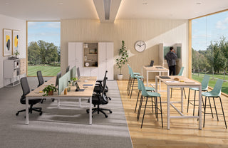 Lifestyle image of a Buronomic Locker Eko four-compartment locker on base in white and wire oak, open office