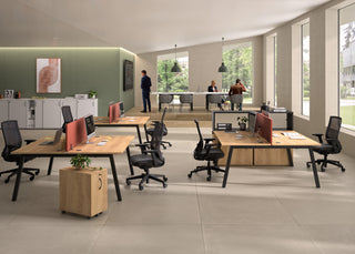 Lifestyle image of white Buronomic Quietude 104 cm sliding door cabinets in an open office with green wall