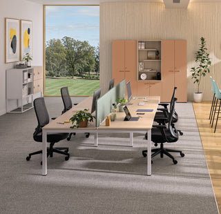 Lifestyle image of Buronomic Quietude storage with alcove in peach and wire oak by workstations